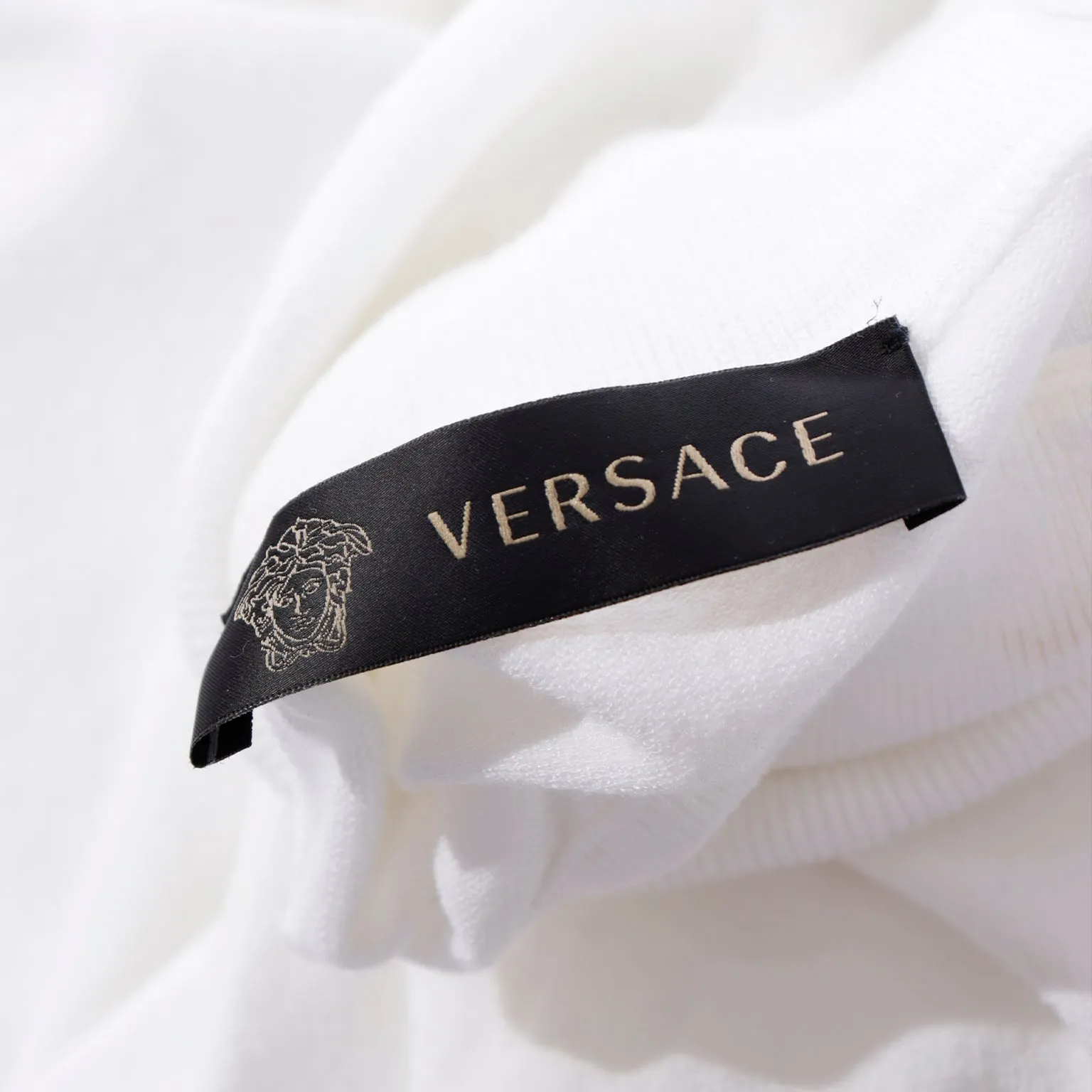 2010s Versace White Stretch Knit T Neck Top With Shoulder Cut Out