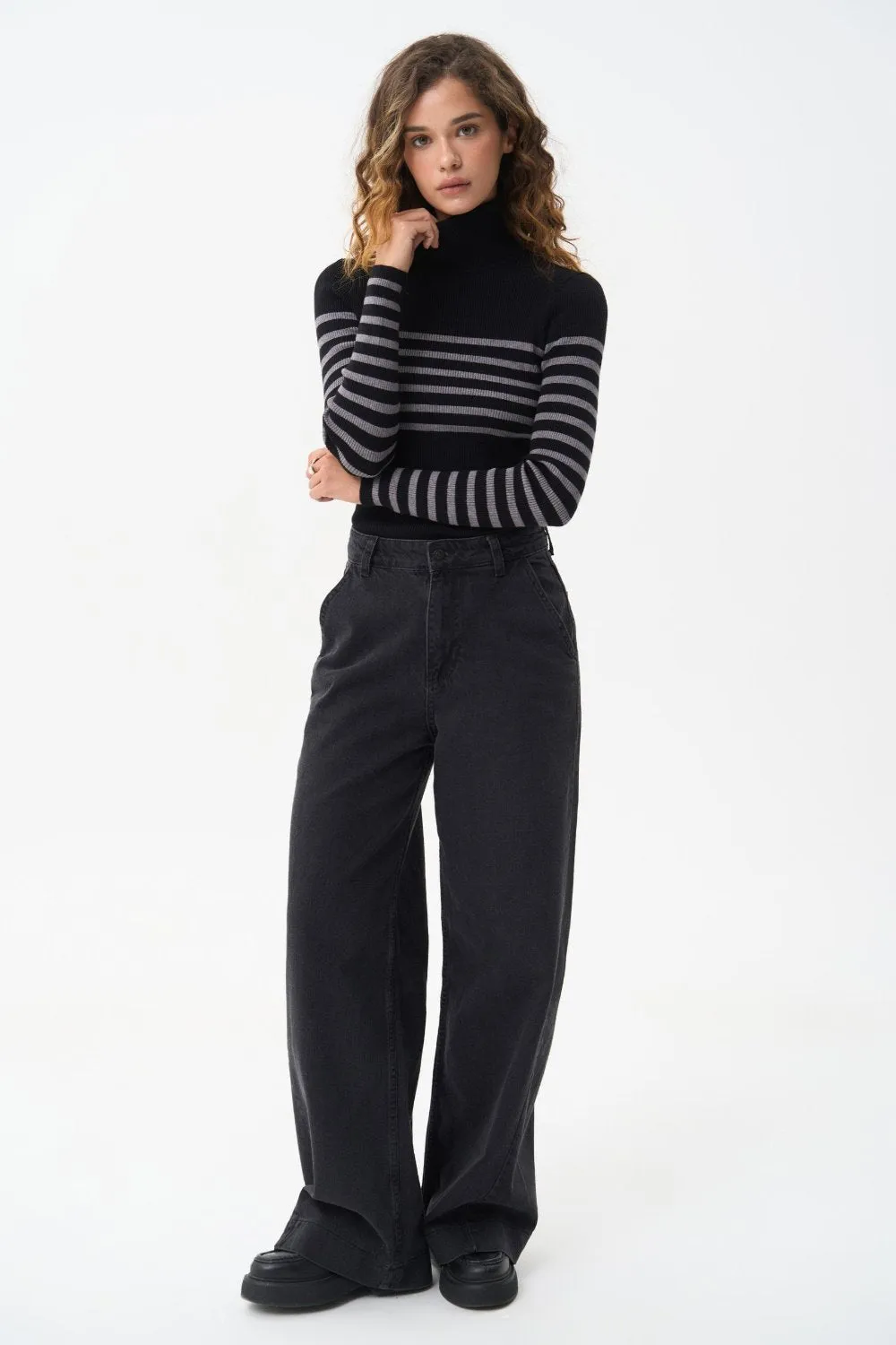 Black turtleneck sweater with a grey stripe